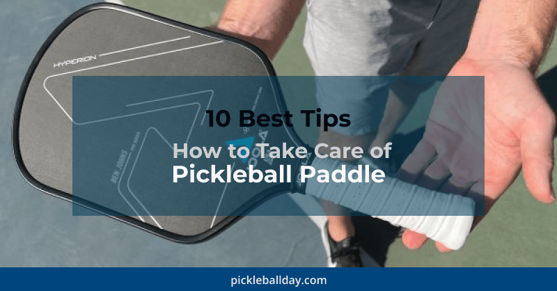 a pickleball player is holding a paddle with care