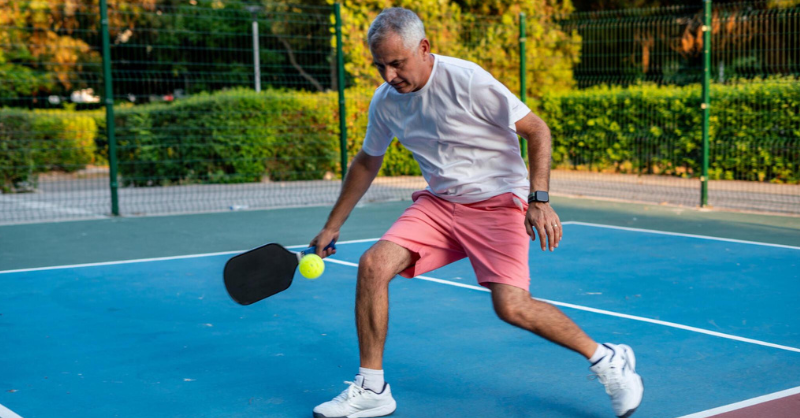 A senior pickleball player shot a ball